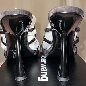 Alexander Wang Nala 105mm logo-plaque sandals (heels)
Alexander Wang